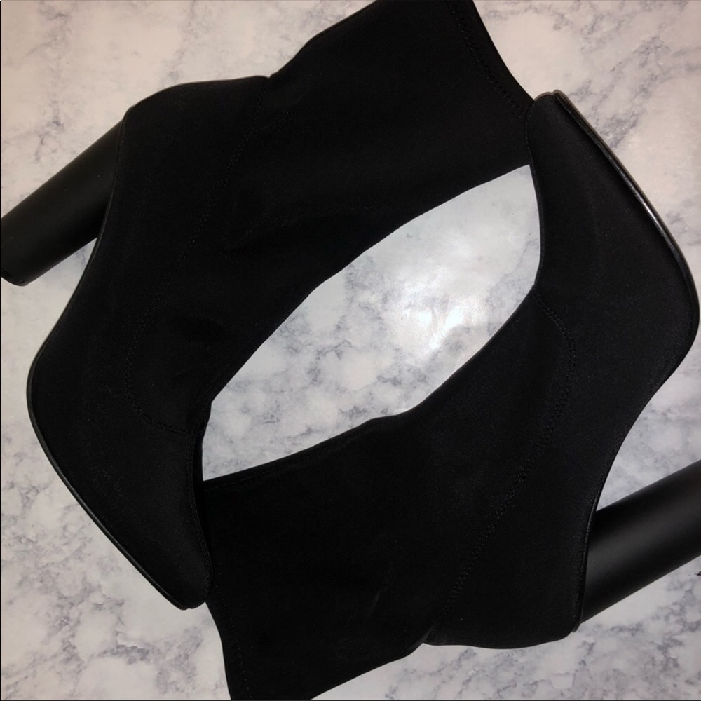 Black cylinder heel sock boots